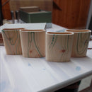 vier verschiedene Flachmänner, bemalt von Naturlieb